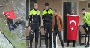 Türk bayrağı ile polis helikopterini selamlayan kadına plaket