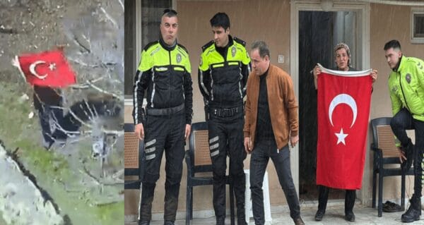 Türk bayrağı ile polis helikopterini selamlayan kadına plaket